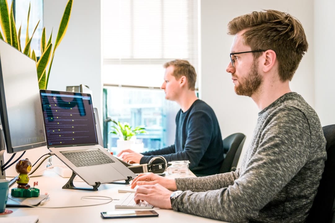 Best Inventory Management Software for Small Business in 2026 Team collaborating on business software in an office