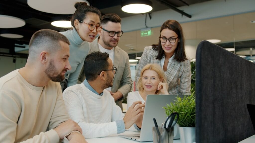 Best Construction Management Software in 2026: 5 Platforms Compared Small business team reviewing SaaS software together