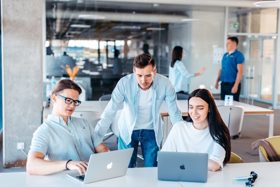 Best Real Estate CRM Software in 2026: 5 Picks for Agents and Teams Small business team evaluating software on a laptop